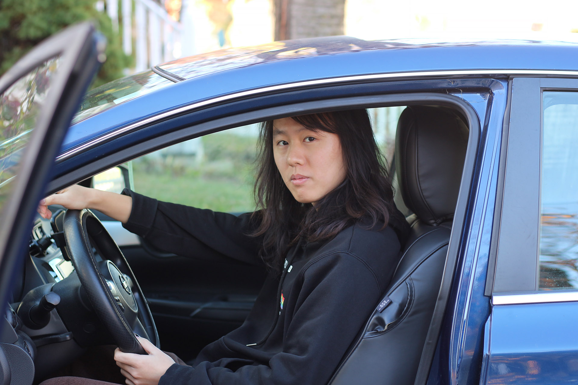 Chen Wang and his car